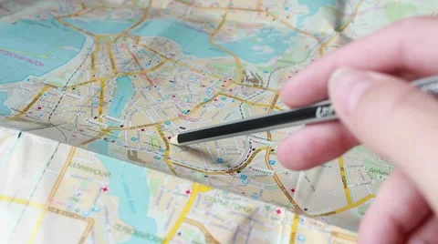 Someone is studying a city map Stock Footage 61695391