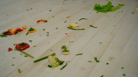 Someone sweeping the floor in the kitchen 库存影片 127286223