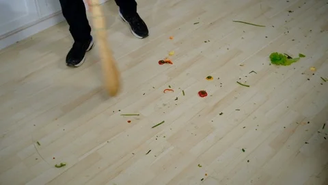 Someone sweeping the floor in the kitchen Stock-Footage 127286230