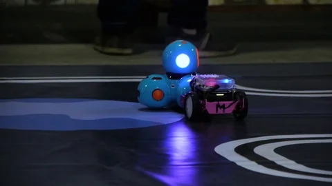 Someone takes the hands of a mini robot that traveled over the surface Stock Footage 81722797