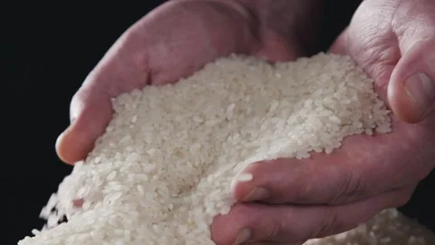 Someone taking the rice in hands. Stock Footage 140484166