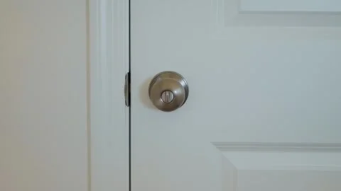 Someone trying to get in locked door Stock Footage 286179111