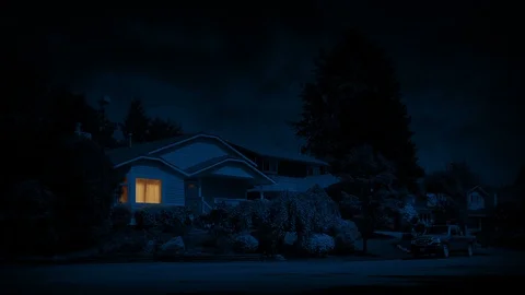 Someone Turns On Light And Walks Past In House At Night Stock Footage