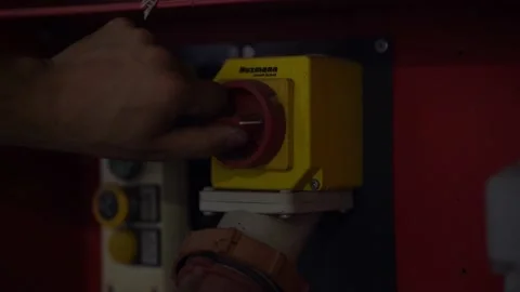 Someone turns off a machine by switching the switch Stock Footage 203855881