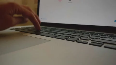 Someone is typing on a laptop keyboard. Stock Footage 195091555