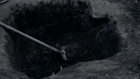 Someone unknown person is digging me a dark black and white scary video. The Stock Footage 293203002