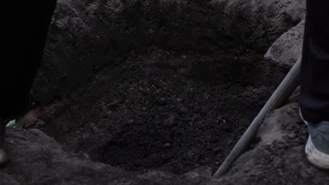 someone unknown person is digging me a d... | Stock Video | Pond5