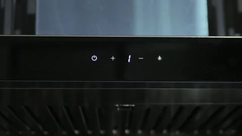 Someone uses finger to set speed level of cooker hood. This clip was shot in the Stock Footage 146599189
