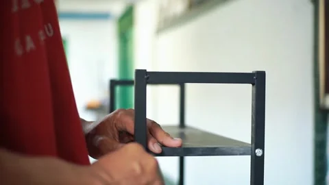 Someone using a screwdriver Stock Footage 325352877