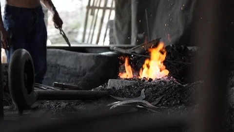 Someone was burning charcoal to make a blacksmith's fire Stock Footage 262707464