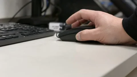 Someone work with mouse low angle view Stock Footage 170152019