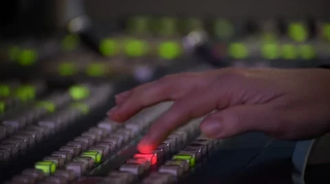 Someone working on a broadcast Video Switcher and pulling the T-Bar Stock Footage 48041477