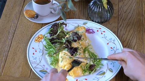 Someone's cutting the omelette Stock Footage 130851840