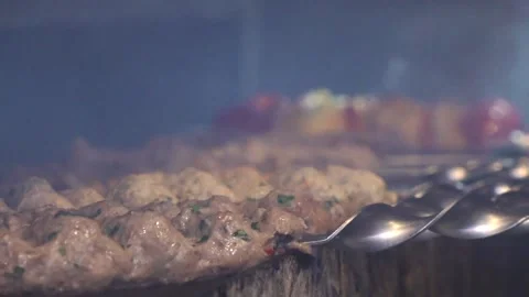Someone's frying a kebab. Stock Footage 131208270