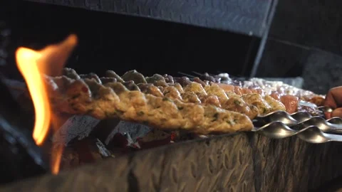 Someone's frying a kebab. Stock Footage 132310784