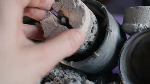 Someone's hand pulls the core from the crown for drilling solid concrete, silica Stock Footage 128829398