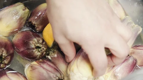 Someone's taking the artichoke Stock Footage 114211282
