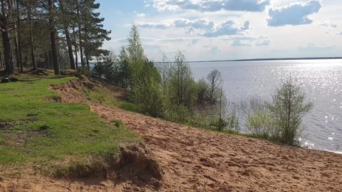 Somersault off a cliff. Man doing flips on the sand slow motion Stock Footage 108178613