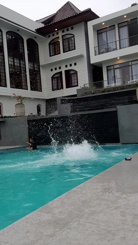 Somersaults in the pool Stock Footage 231541464