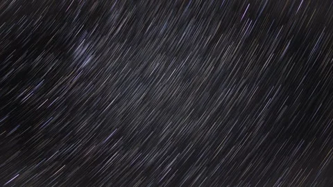 Somewhat abstract time lapse of a star filled sky produced in a star trails Vídeos de archivo 256032663