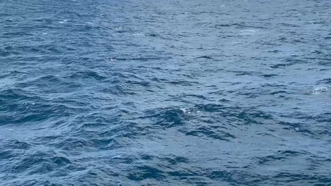 Somewhat rough open seas on a clear day water background with copy space Stock-Footage 105072574