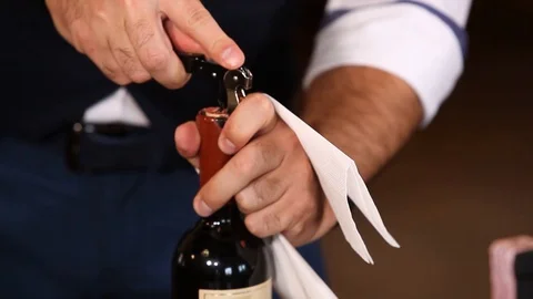 Sommelier opens a bottle Stock-Footage 113270221