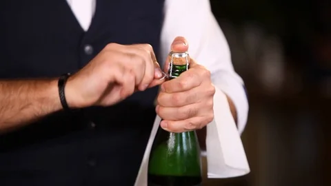 Sommelier opens a bottle Stock Footage 113270979