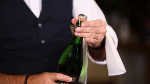 Sommelier opens a bottle Stock Footage 113271274