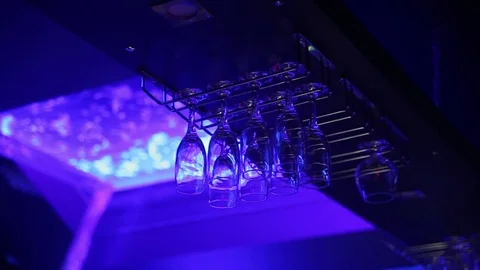 Sommelier a row of crystal glasses lined up in perspective Stock Footage 71216975