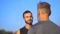 The son and a father talking outdoor. slow motion 4k or 4k+ Resolution