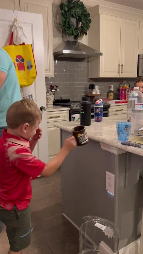 Son Dumps Cocoa Powder on His Face, usa - 02 Dec 2022 Stock Footage 229718067