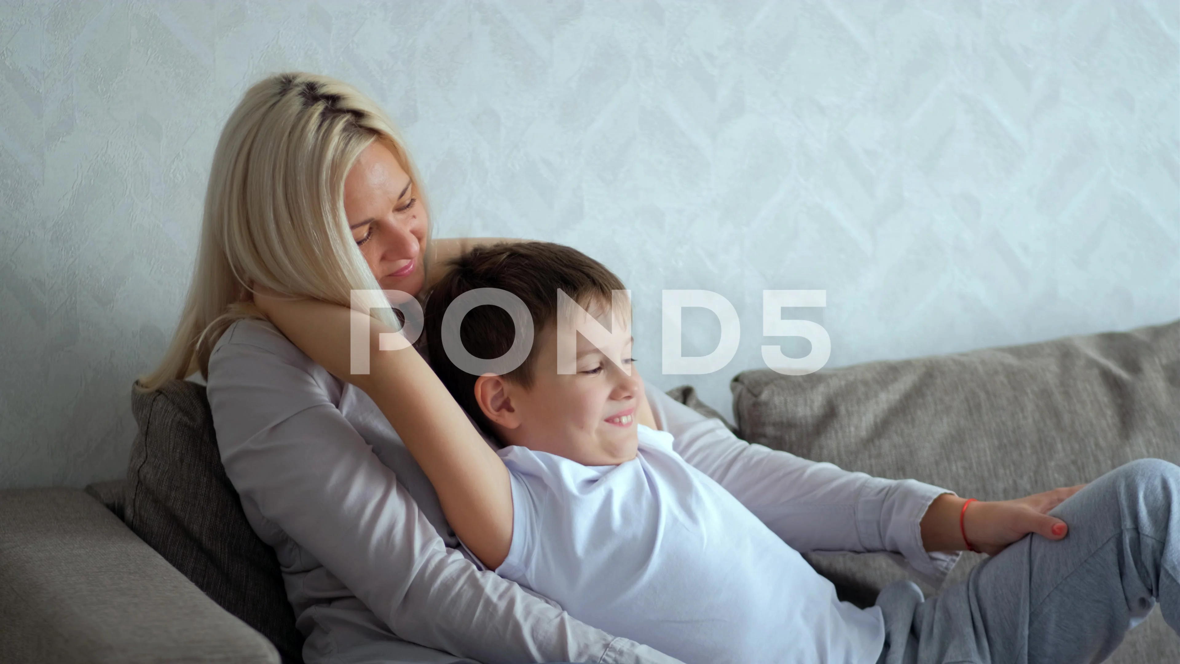 3840px x 2160px - son hugs his mom. boy shows love to his ... | Stock Video | Pond5