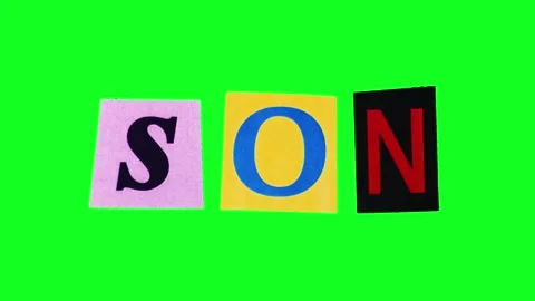 Son title made of rectangle pieces of paper crumpling and unwrapping on green Stock Footage 312968941