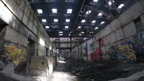 A Сoncrete Base Corridor Inside Of An Abandoned Warehouse Stock Footage 130900110