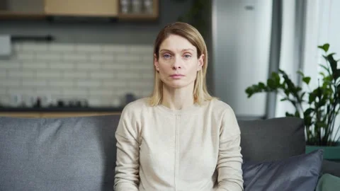 Сonfident woman looking at camera and Stock Video Pond5