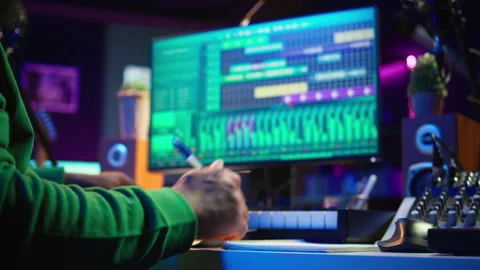 Songwriter writes down lines and melodic elements to create new tunes Stock Footage 281375422