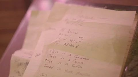 Songwriting Close Up Pen on Paper Notes Music Lyrics Video stock 125054229