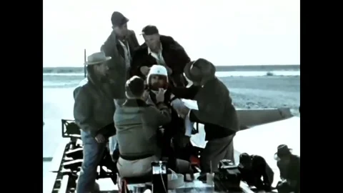 The Sonic Wind rocket sled is ridden by Colonel John Paul Stapp, M.D., Ph.D., Stock Footage 79517162