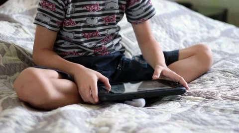 The sonny plays the console Video stock 60659592