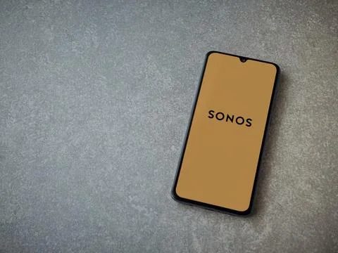 Sonos app launch screen on smartphone on ceramic stone background Stock Photos