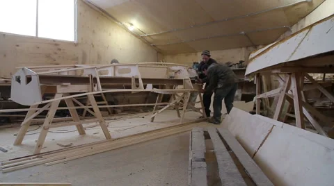 Сonstruction of a boat at the shipyard Stock Footage 59560314