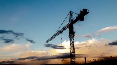 Сonstruction crane with beautiful evening clouds on background. Stock Footage 275328254