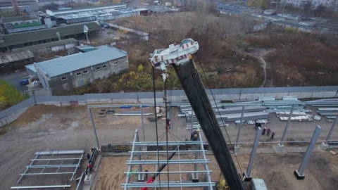 Сonstruction crane works on the construction of a framed iron roof Stock Footage 172129242
