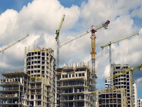Сonstruction cranes build residential complex. Stock Footage 81204894