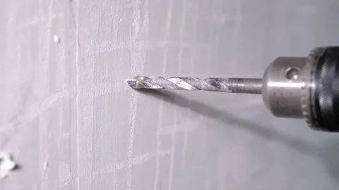 Сonstruction worker drilling hole in wall with drill. Stock Footage 134790220