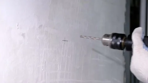 Сonstruction worker drilling hole in wall with drill. Stock Footage 135143420