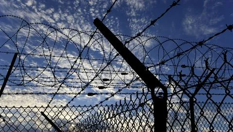 Сontour of barbed wire Stock Photos