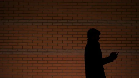 Сontract kill - the killer strangles the victim with a plastic bag 動画素材 122159100