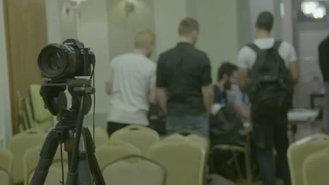 Sony camera mounted on a tripod in an event room Stock Footage 341974337