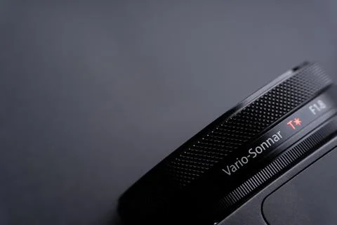 Sony compact or mirrorless camera closeup on black background 库存照片